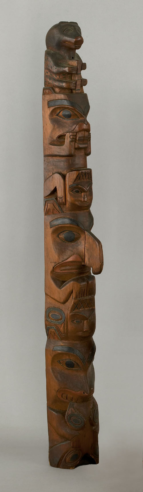 Appraisal: Northwest coast carved and painted totem ca h Provenance Descended