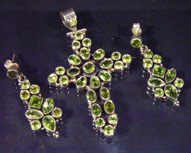 Appraisal: Silver cross pendant and matching earrings set with a green