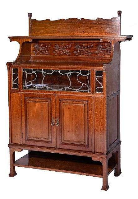 Appraisal: Carved mahogany cabinet in the manner of McMurdocirca having a