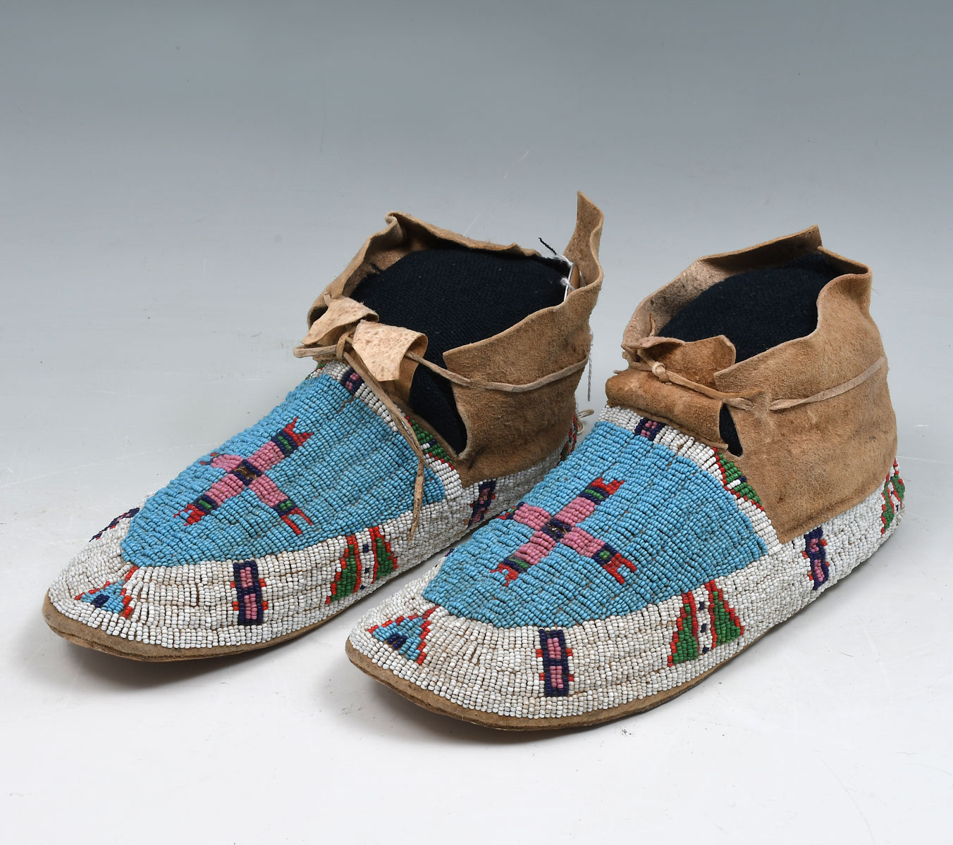 Appraisal: AMERICAN INDIAN BEADED MOCCASINS Ca Sioux Native American Indian fully