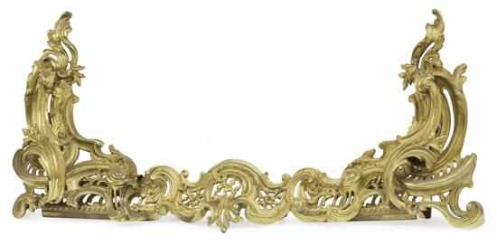 Appraisal: A FRENCH LOUIS XV STYLE GILT BRASS FIRE FENDER FOUNDRY