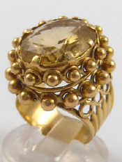 Appraisal: A yellow metal tests carat gold citrine ring citrine approx