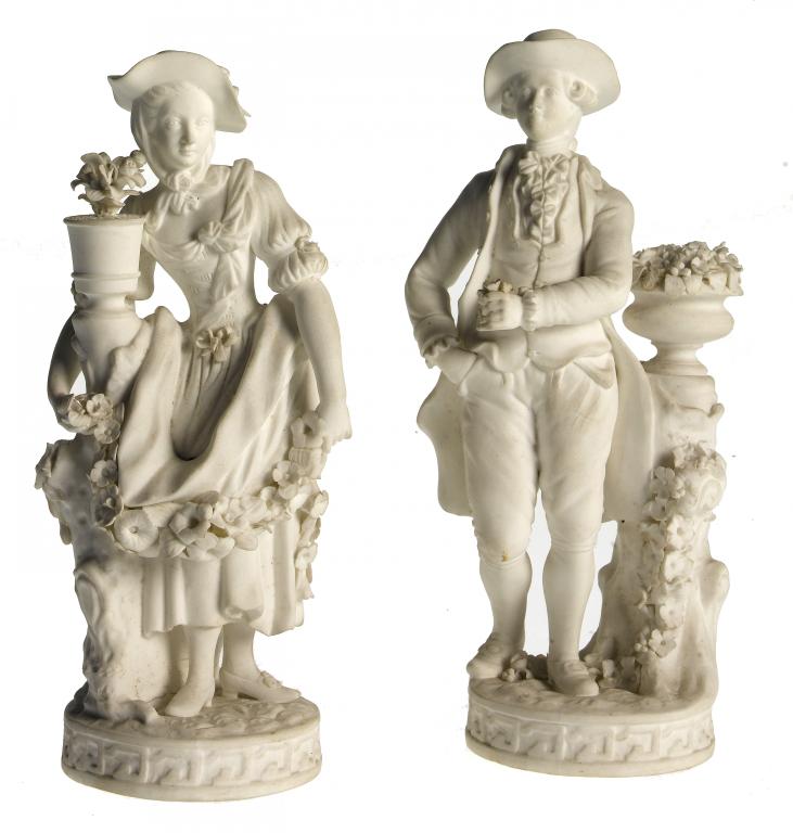 Appraisal: A PAIR OF MINTON BISCUIT FIGURES of a female with