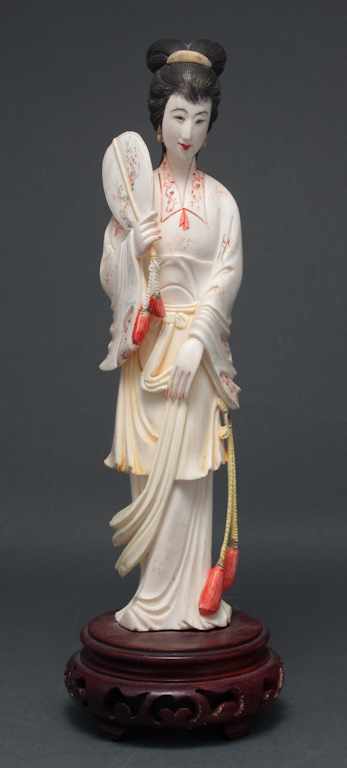 Appraisal: Japanese carved and polychromed ivory figure of a Geisha modeled