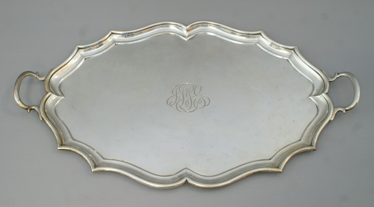 Appraisal: Edwardian sterling silver oval scalloped flat bottom handled tray London