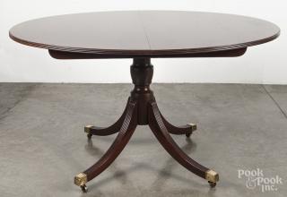 Appraisal: Baker Federal style mahogany dining table with two '' leaves