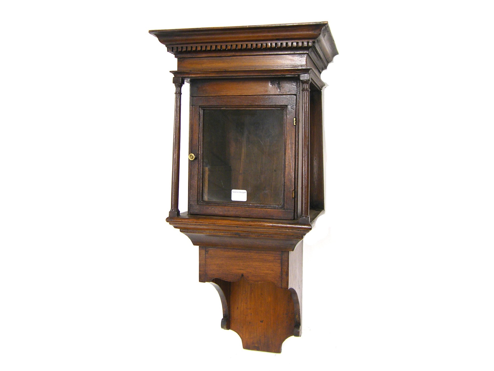 Appraisal: Good stained pine hooded wall clock case with aperture for