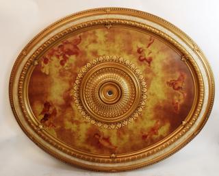 Appraisal: Large scale oval ceiling medallion with cherubs Large scale oval