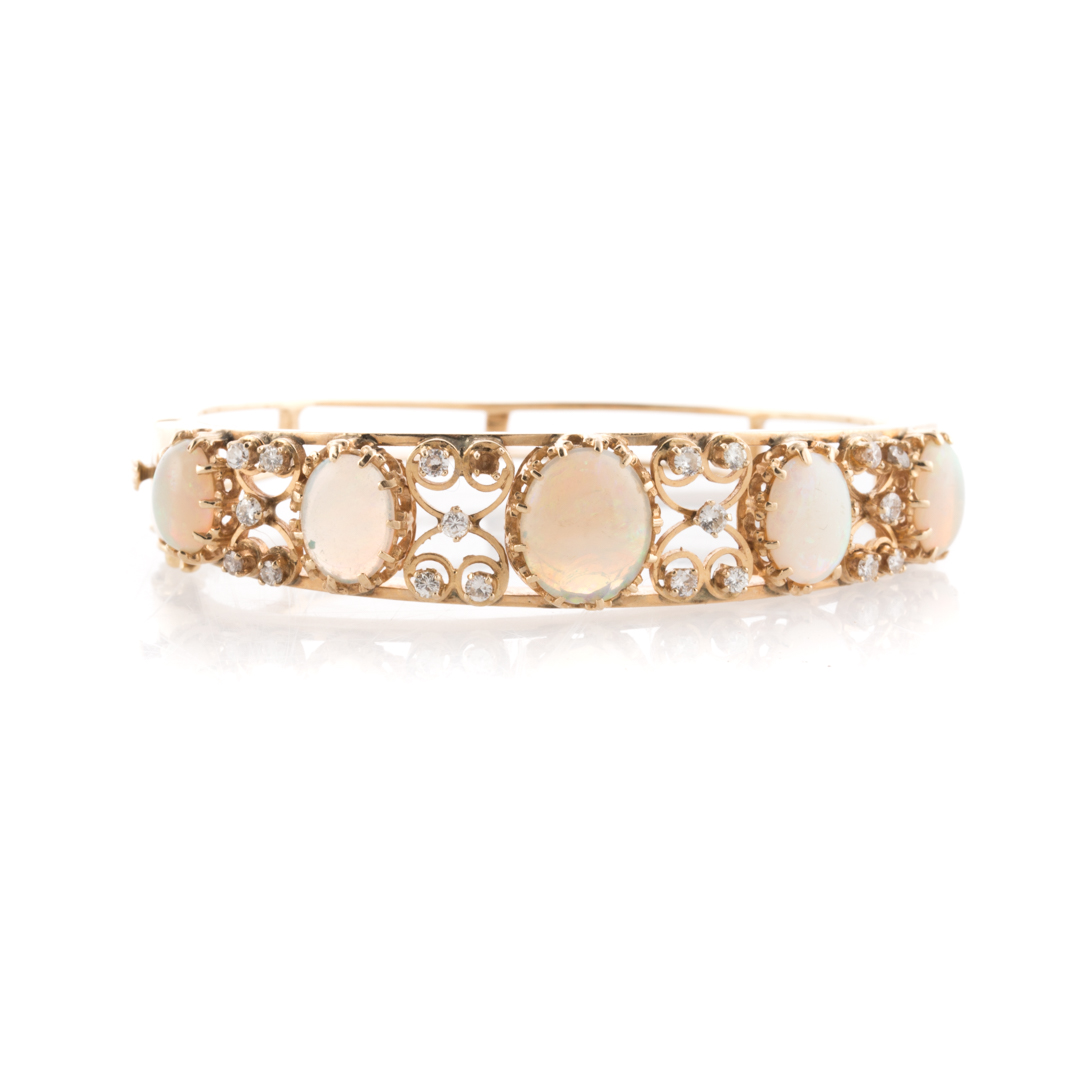 Appraisal: A K Opal Diamond Hinged Bangle Bracelet K yellow gold