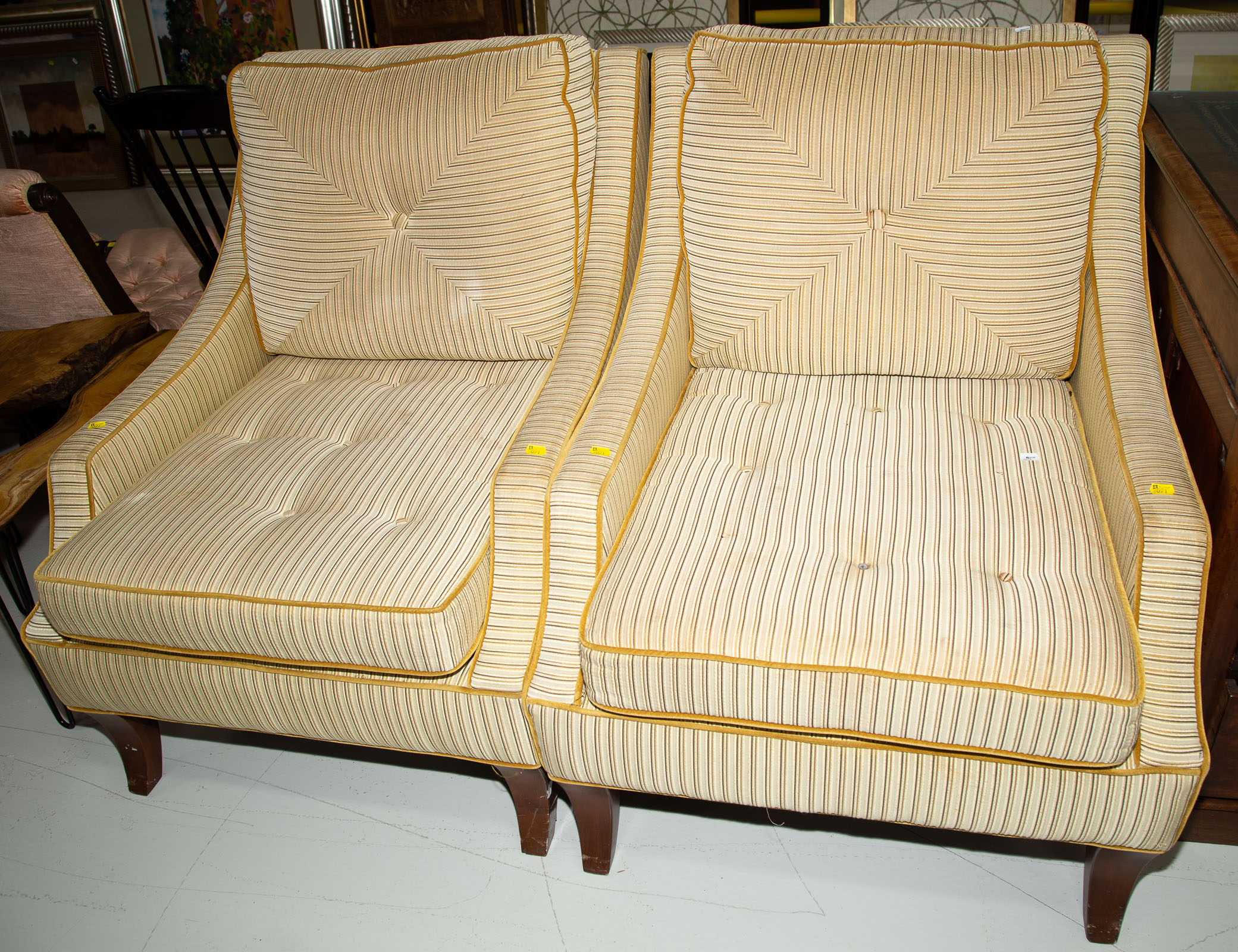 Appraisal: A PAIR OF UPHOLSTERED ARM CHAIRS Approximately in H in