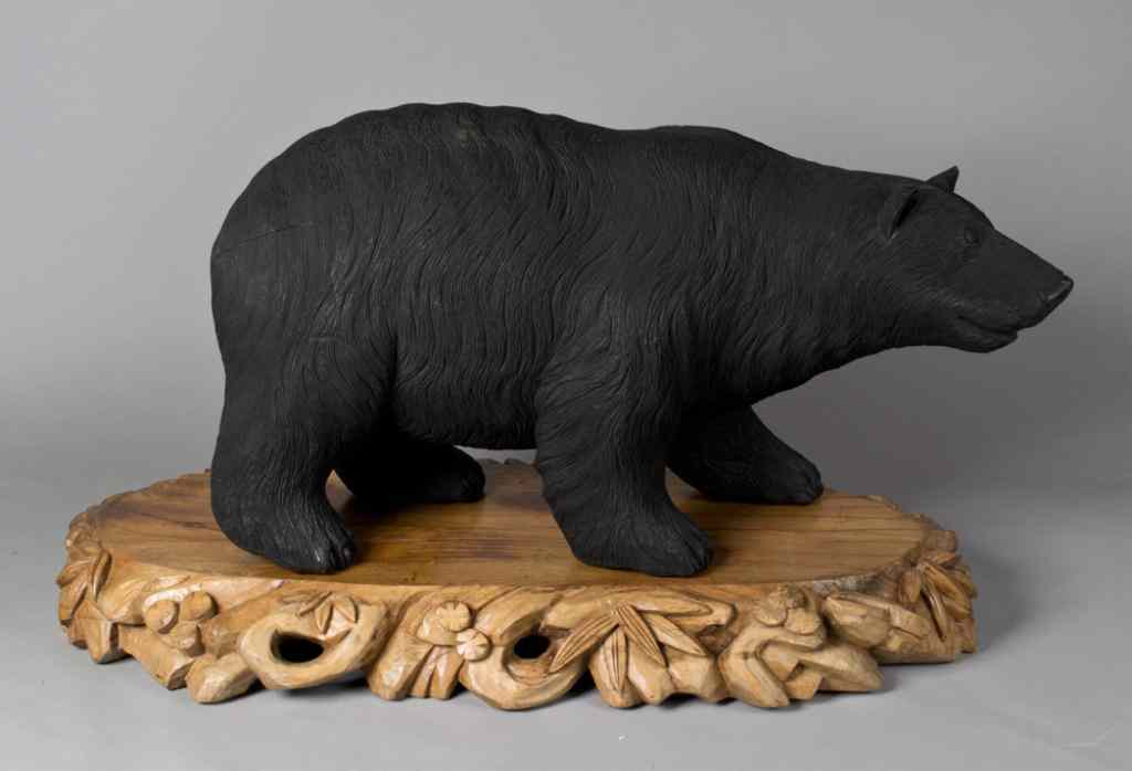 Appraisal: A Fine and Massive American Carved Black BearFinely carved to