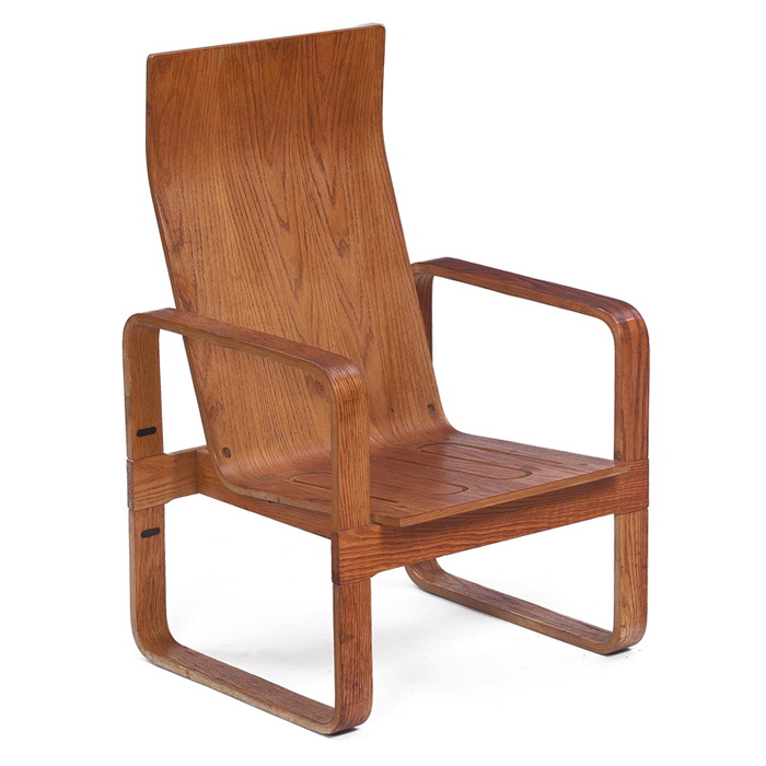 Appraisal: Thonet lounge chair USA oak plywood high-back form with cutout