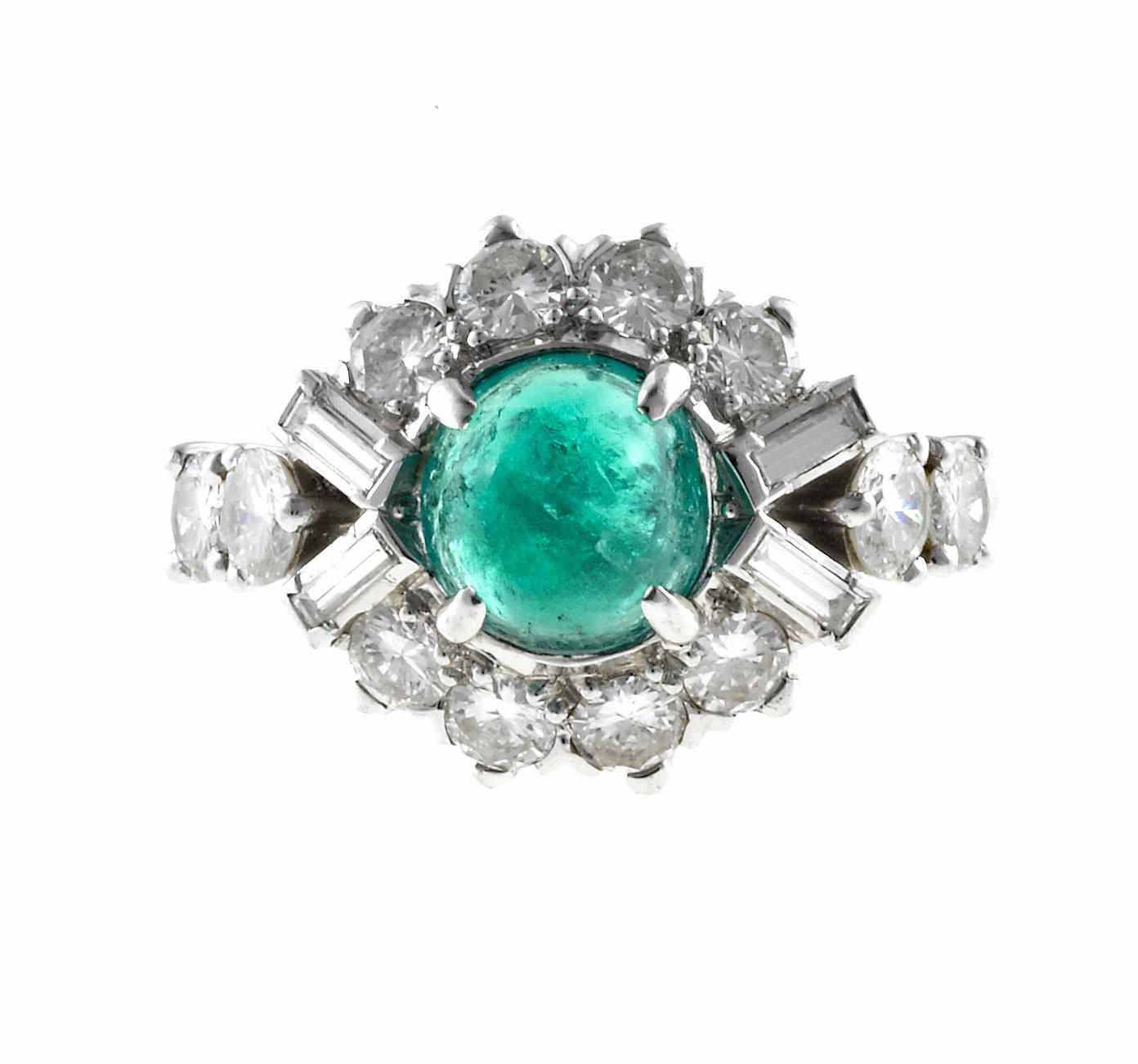 Appraisal: An emerald and diamond ring Morgan signed Morgan centering a