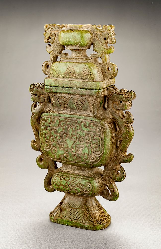 Appraisal: Chinese Carved Jadeite Covered Urn DESCRIPTION Chinese carved jadeite covered