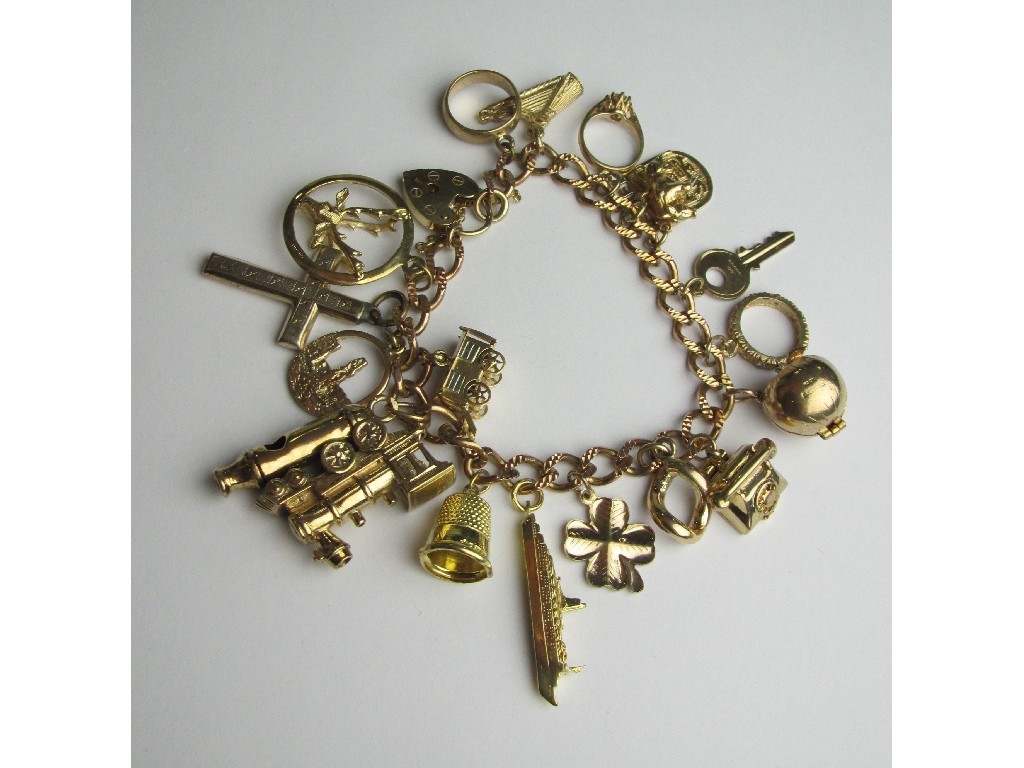 Appraisal: Nine carat gold charm bracelet with various gold charms Total