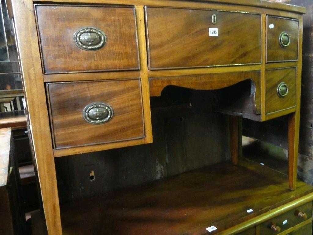 Appraisal: An Edwardian mahogany bow fronted side table in the Georgian