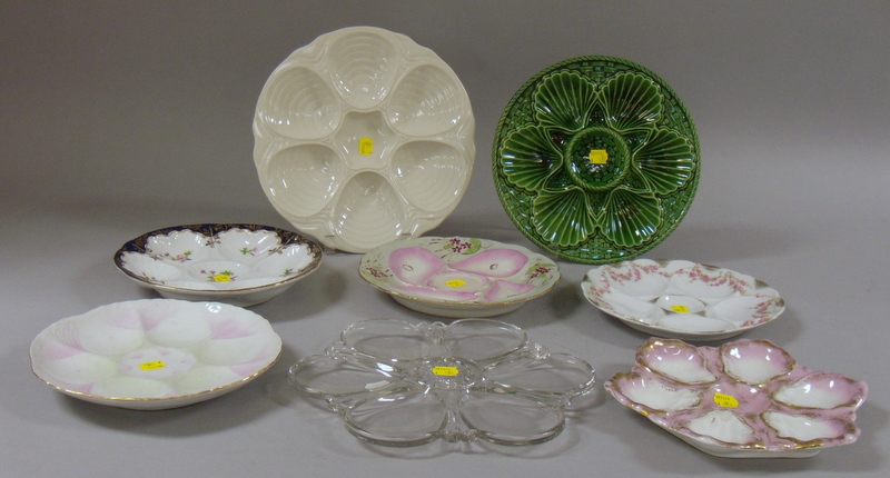 Appraisal: Six Ceramic Oyster Plates and a Colorless Pressed Glass Oyster