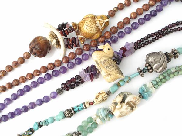 Appraisal: A collection of Netsuke and bead stone necklaces