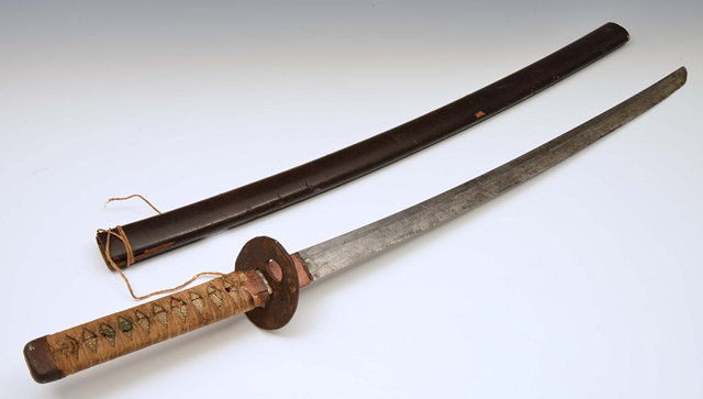 Appraisal: A JAPANESE SWORD with iron tsuba and Shakudo mounted handle