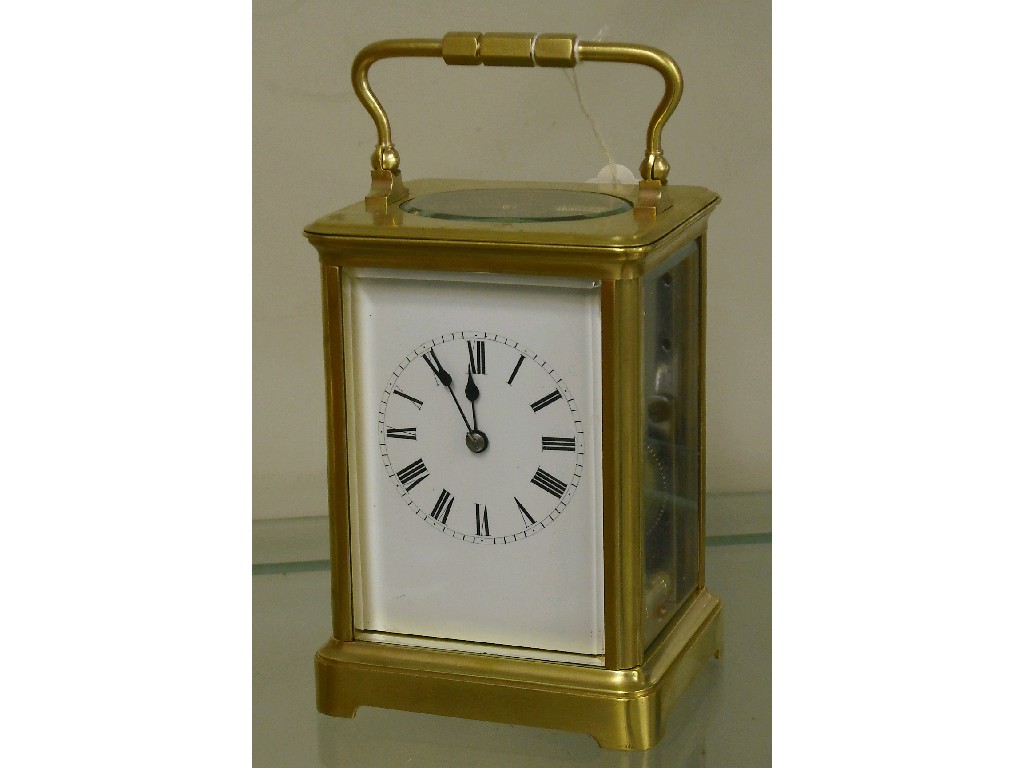 Appraisal: Brass striking carriage clock within a corniche style gilded case