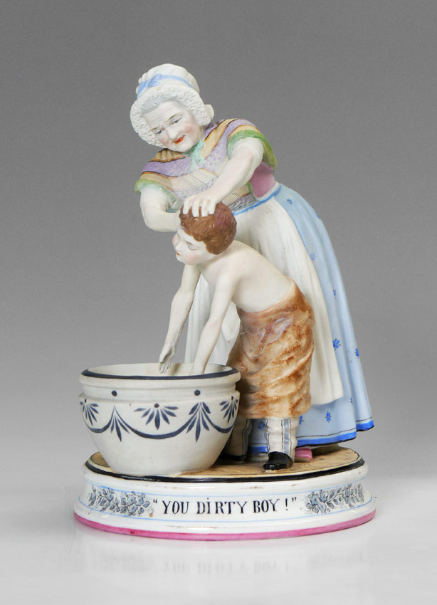 Appraisal: VICTORIAN YOU DIRTY BOY BISQUE FIGURAL GROUP Figure of an