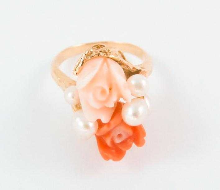 Appraisal: CORAL PEARL AND FOURTEEN KARAT GOLD RING set with two