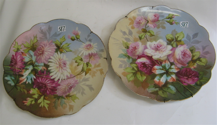 Appraisal: TWO LIMOGES FRANCE PORCELAIN CHARGERS - D hand painted in