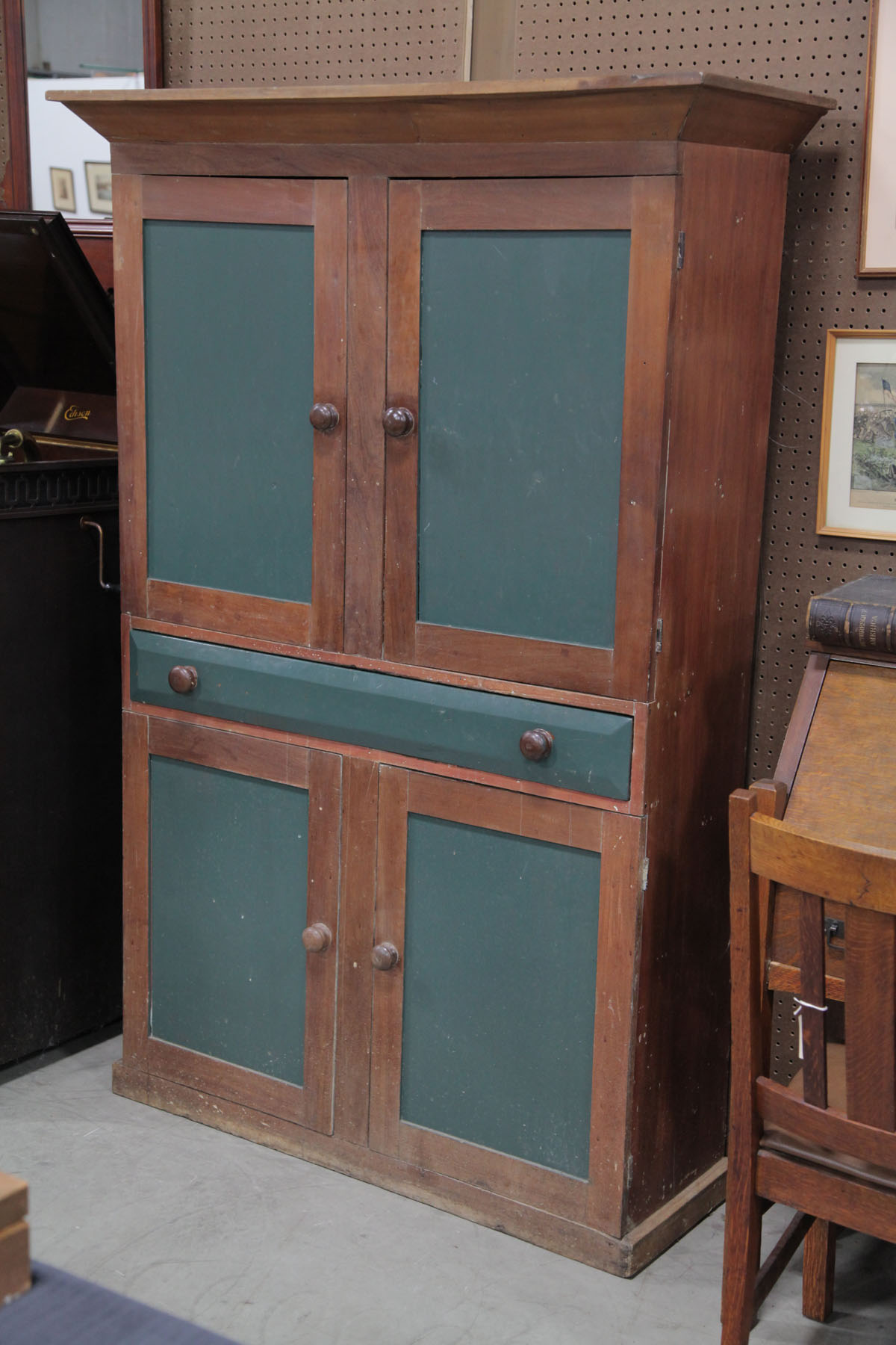 Appraisal: ONE PIECE WALL CUPBOARD American mid th century Cherry nail