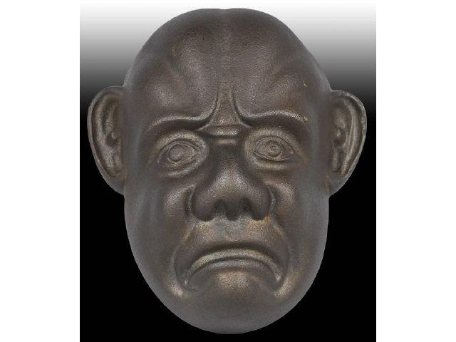 Appraisal: Cast Iron Frowning Face Still Bank Description Hanging Made in