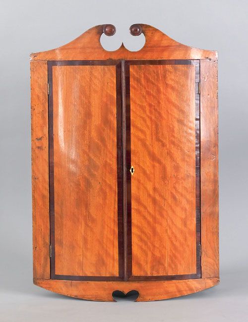 Appraisal: Beidermeyer mahogany bowfront hanging cupboard ca h w