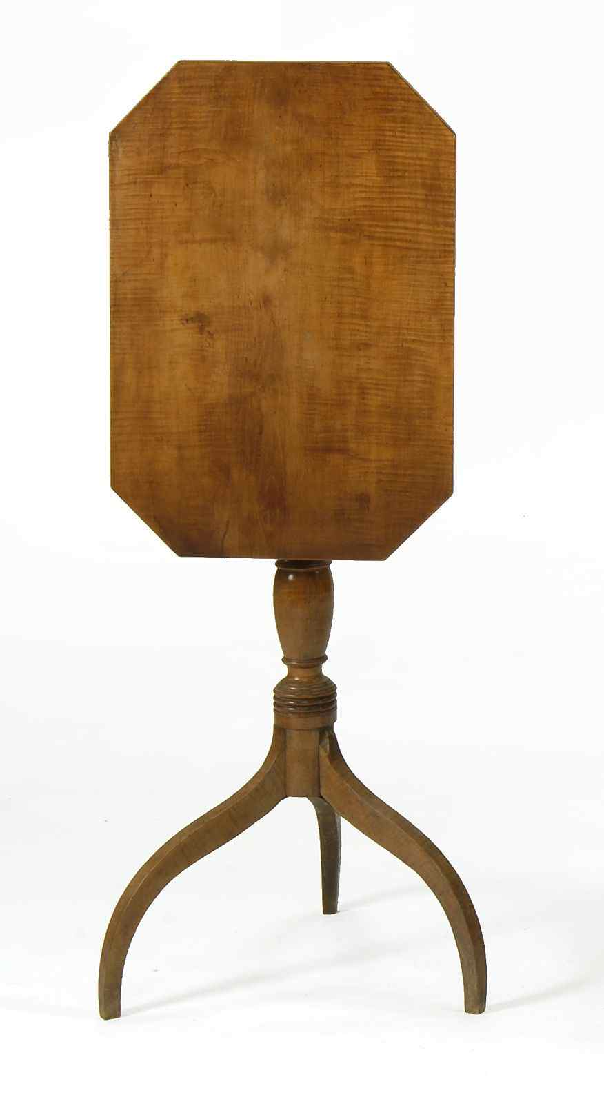 Appraisal: ANTIQUE AMERICAN TILT-TOP SPIDER-LEG CANDLESTANDEarly th CenturyStrong tiger maple octagonal