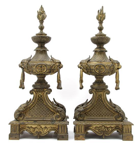 Appraisal: Pair of Neoclassical Gilt Bronze Chenet each with flame finial