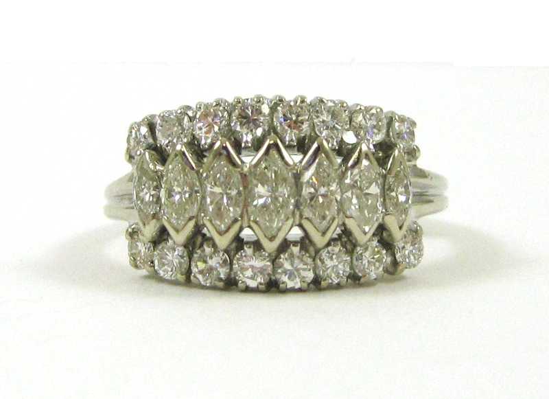 Appraisal: DIAMOND AND FOURTEEN KARAT WHITE GOLD RING set with two