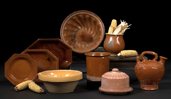 Appraisal: Three French Provincial Umber-Swirled Tobacco -Glazed Pottery Plates first quarter