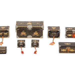 Appraisal: Eight Japanese Gilt and Black Lacquered Boxes th Century Largest