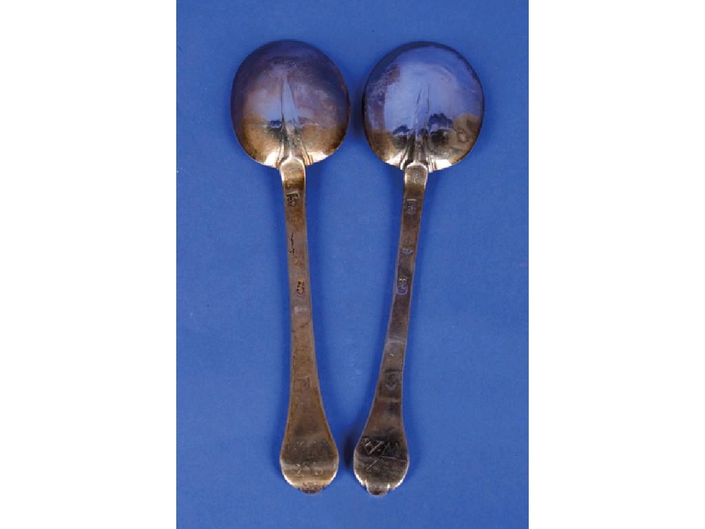 Appraisal: A PAIR OF CHARLES II TREFID SPOONS the reverse of