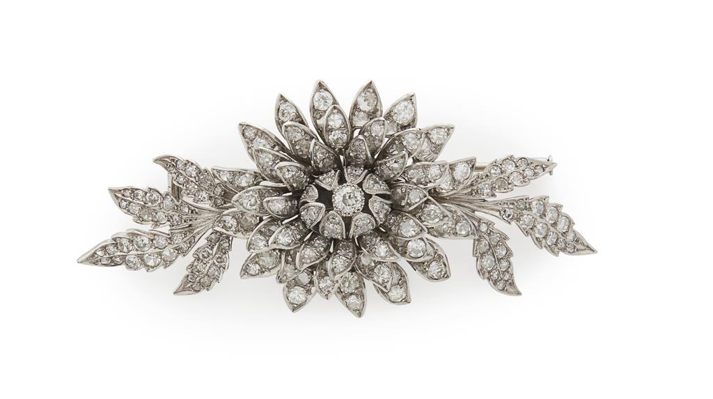 Appraisal: A floral diamond set brooch modelled as a flower in