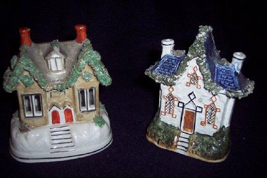 Appraisal: A Staffordshire pastille burner a cottage with blue tiled roof