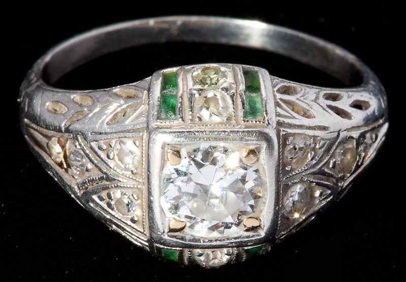 Appraisal: Art Deco Emerald and Diamond Ringconsisting of one round brilliant