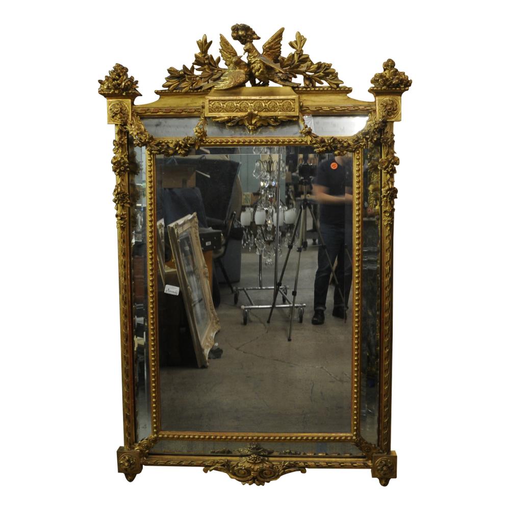 Appraisal: LOUIS XV STYLE CARVED GILTWOOD MIRRORwith surmount of love birds