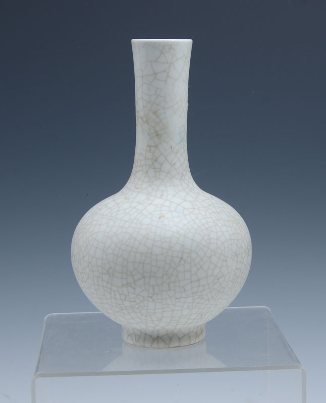 Appraisal: CHINESE EXPORT WHITE CRACKLE GLAZE VASE Tall neck vase with