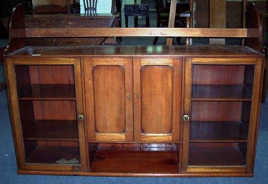 Appraisal: A late th Century hanging cupboard with glazed door to