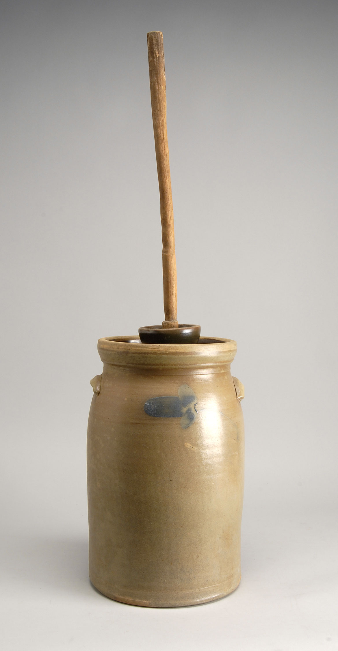 Appraisal: TH CENTURY AMERICAN STONEWARE TWO-GALLON BUTTER CHURN with subtle cobalt