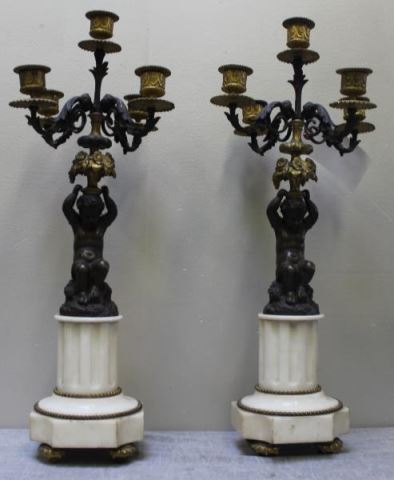 Appraisal: Pair of Quality Bronze and Marble Putti FormCandlebra From a