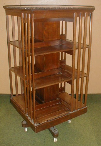 Appraisal: A Victorian walnut revolving bookcase square high