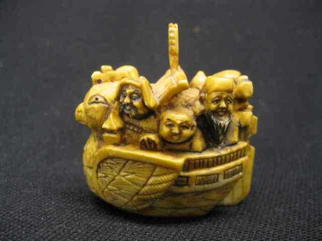 Appraisal: Chinese Carved Ivory Netsuke of Men in Boat men in