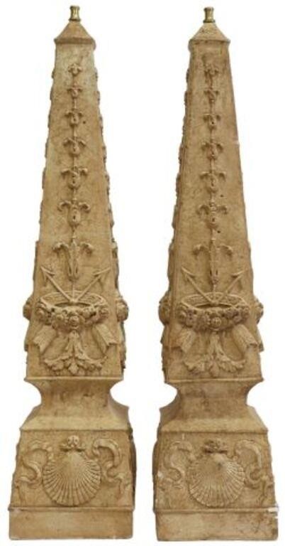 Appraisal: pair Architectural cast plaster obelisks having gold-tone metal finial over