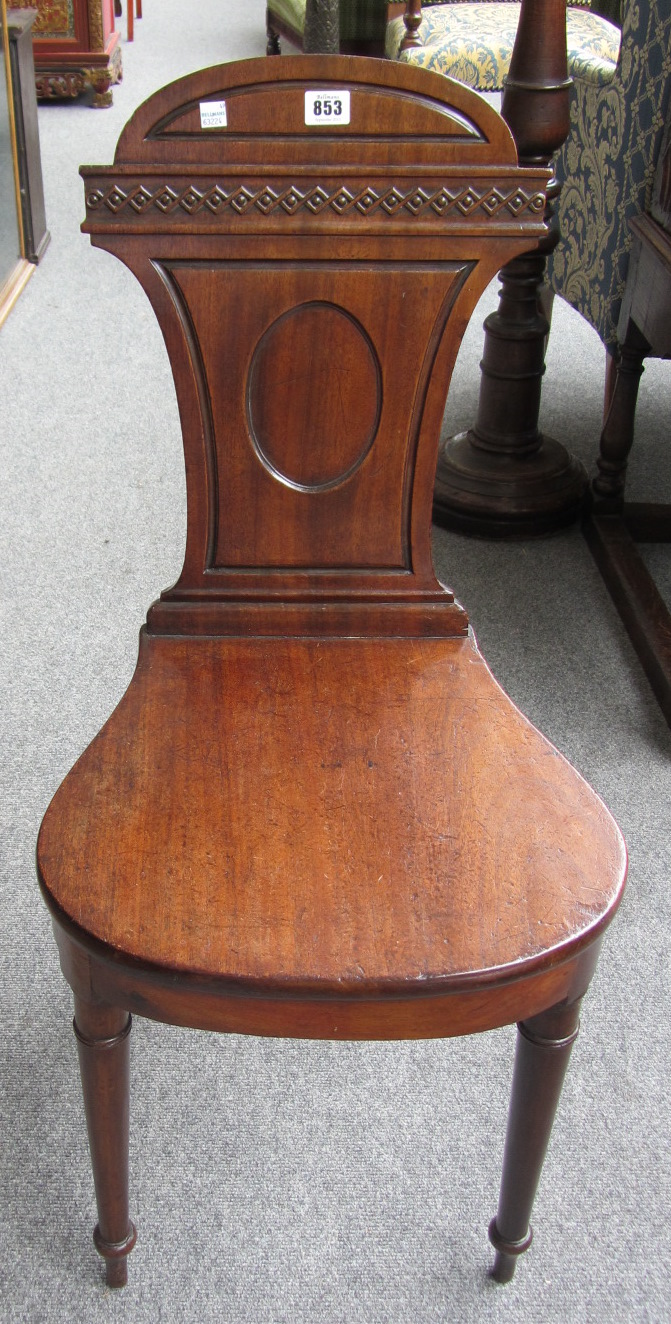 Appraisal: A George III mahogany hall chair with solid seat and