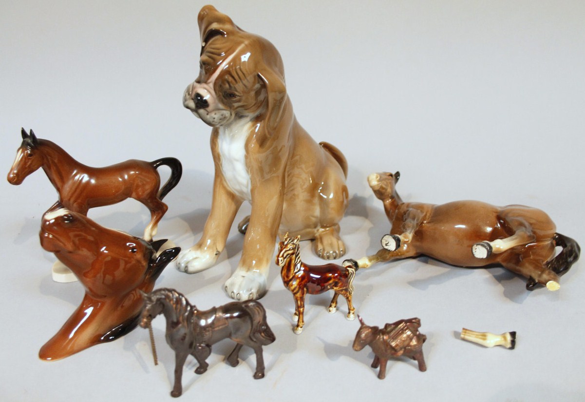 Appraisal: Various thC animal figures to include horse head wall pocket