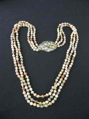 Appraisal: Jasper Gemstone Bead Necklace triple strand '' long carved leaf